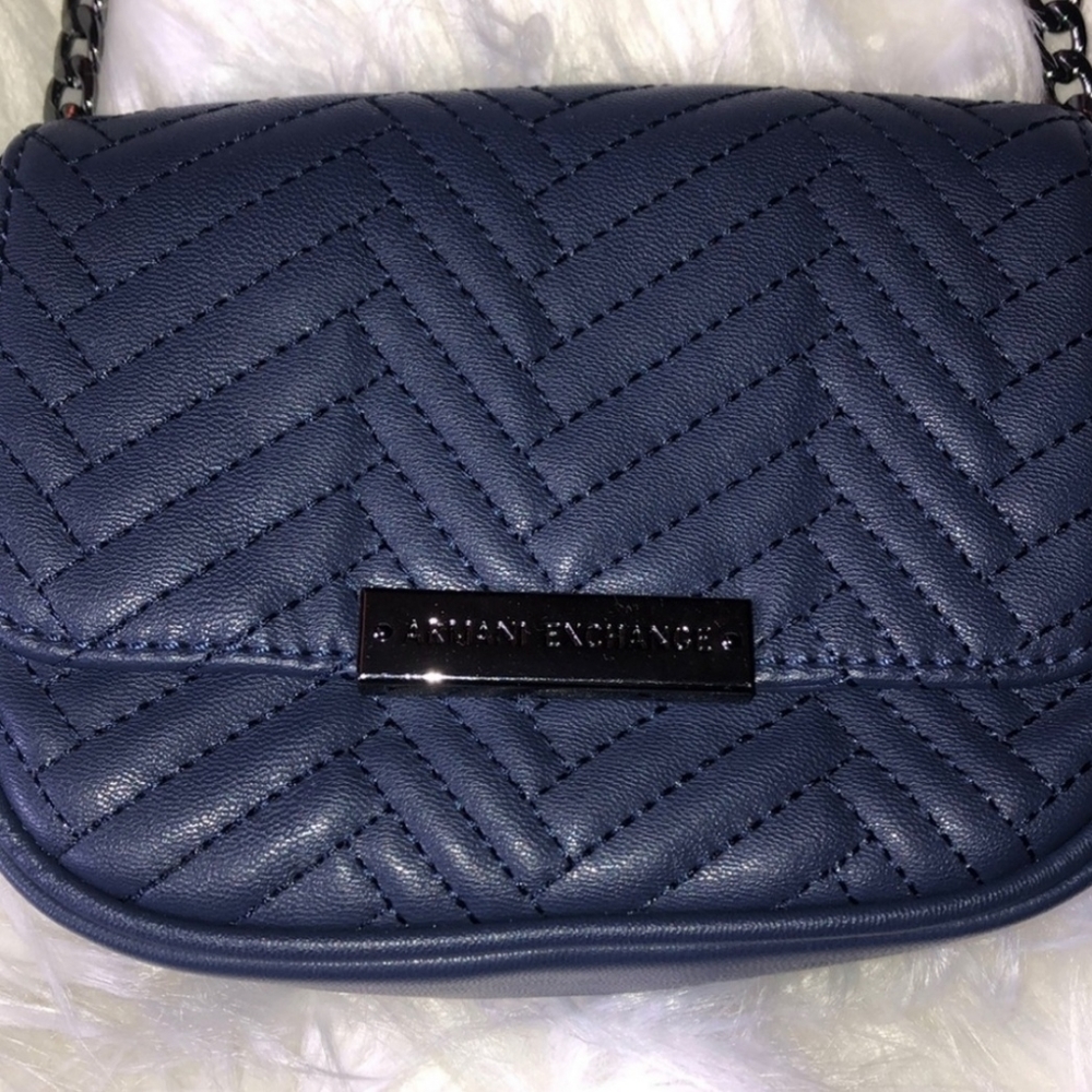 Armani Exchange navy cross body bag
$58 $0 - Picture 2 of 7
